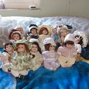 12 collectable small porcelain Doll's.